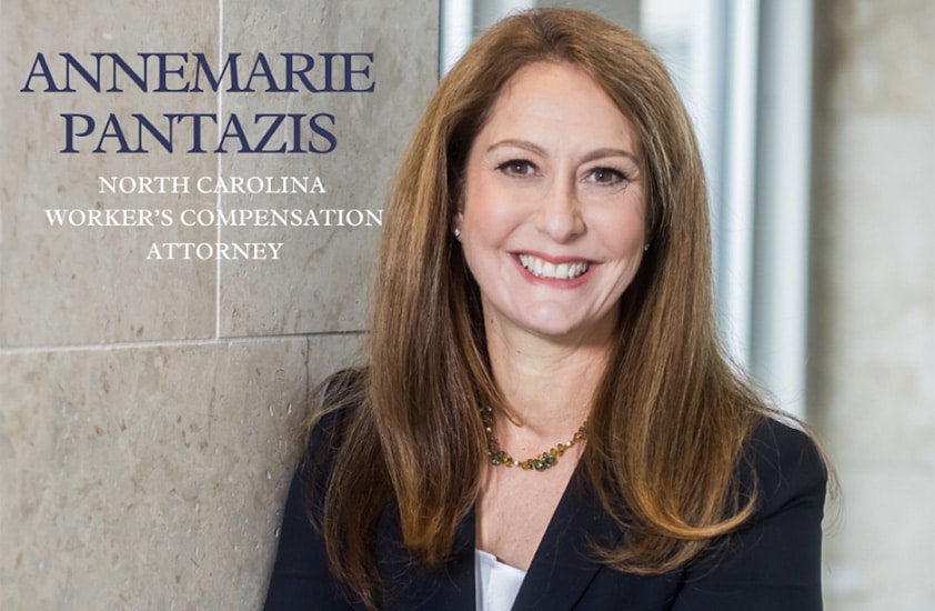 Annamarie Pantazis takes a professional picture as a NC Workers' comp attourney