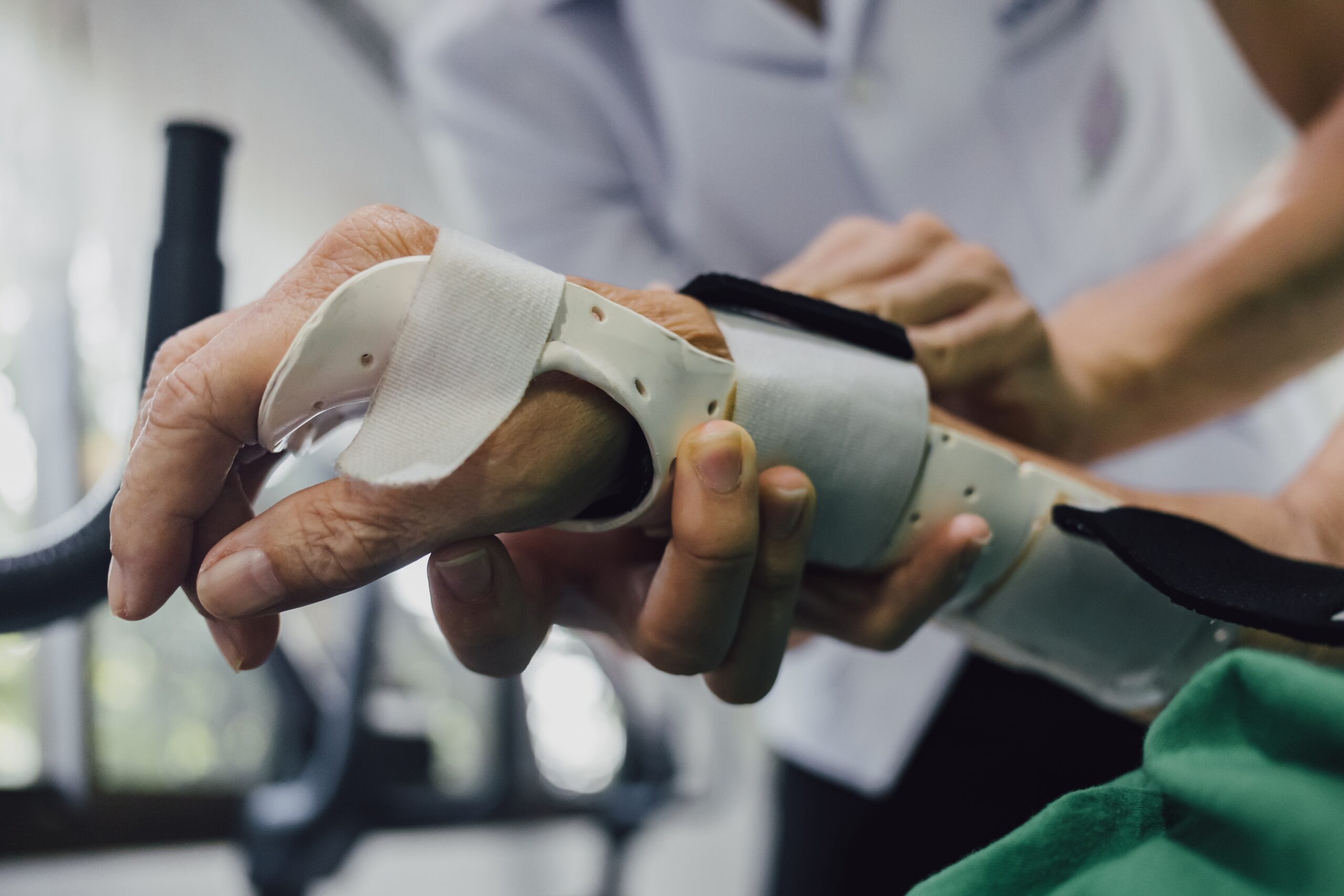 Therapist,Making,Asissistive,Device,For,Immobilize,Patient,Wrist,And,Hand