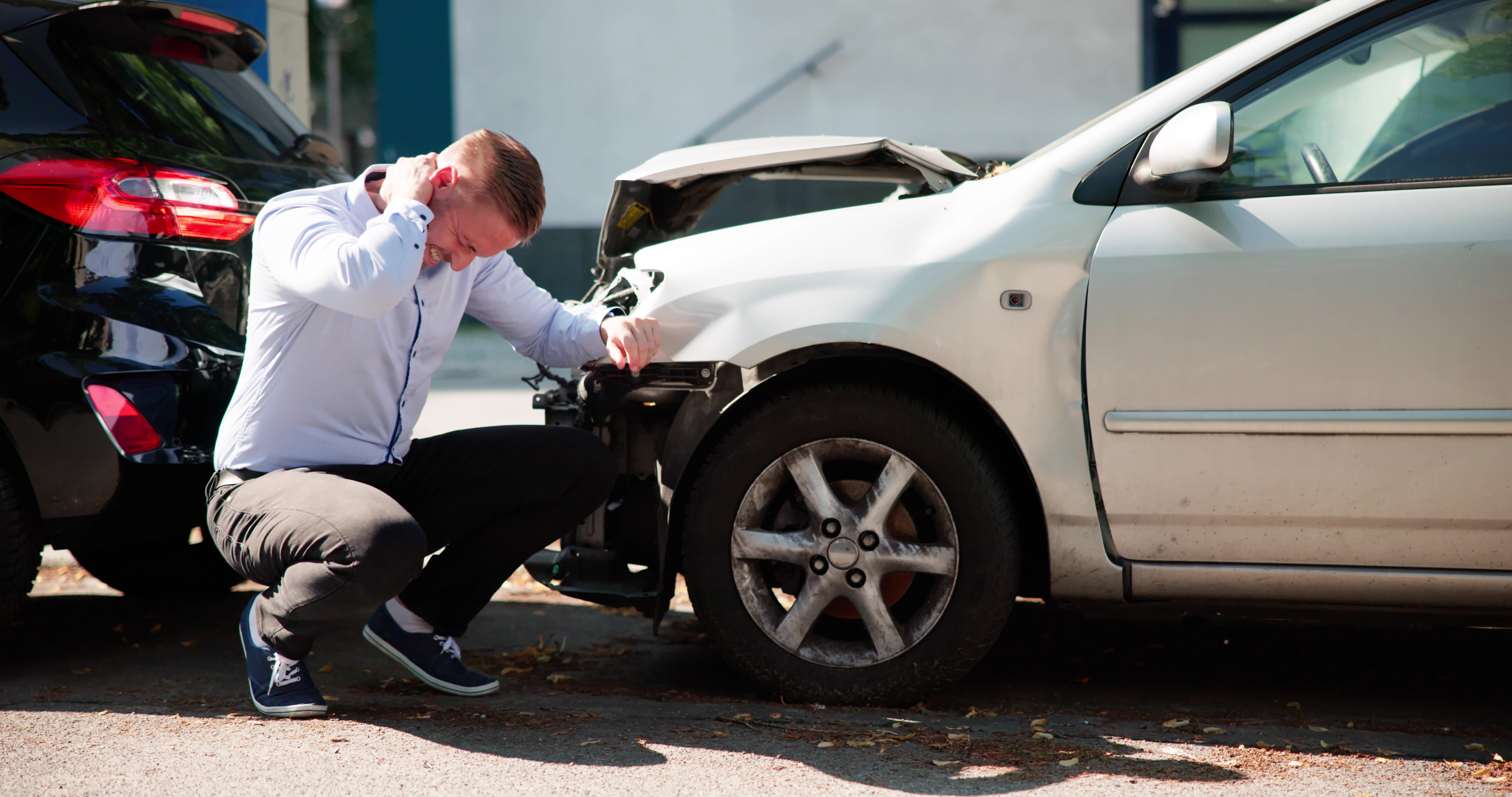 Young,Male,Seeks,Compensation,After,Car,Injury,Causes,Whiplash,Pain.