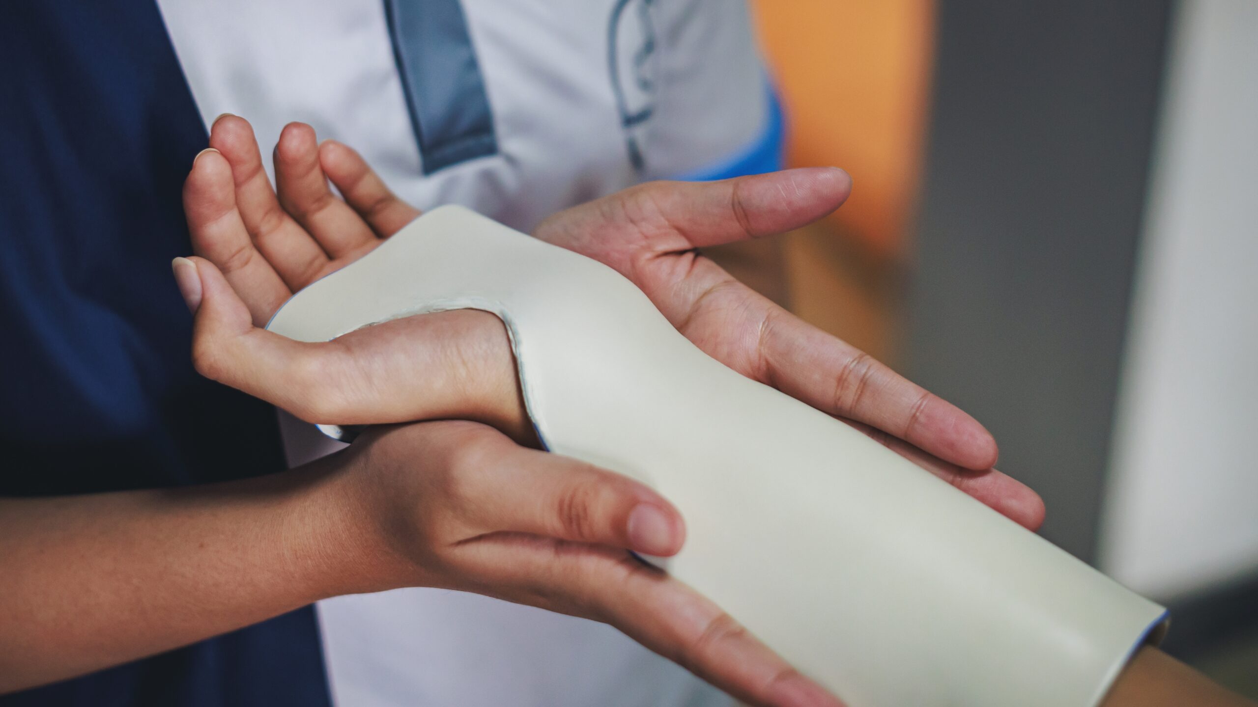 Therapist,Making,Asissistive,Device,For,Immobilize,Patient,Hand,And,Wrist.
