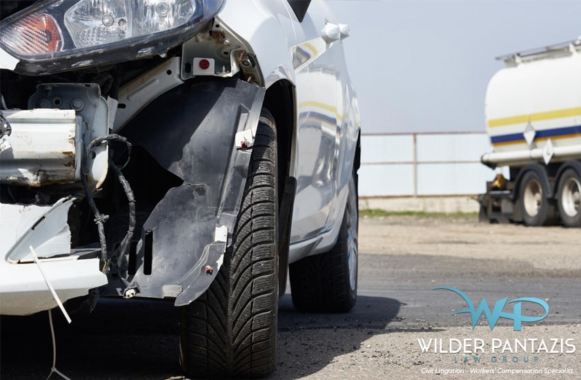 A compact car/suv with a crash mark on the front bumper