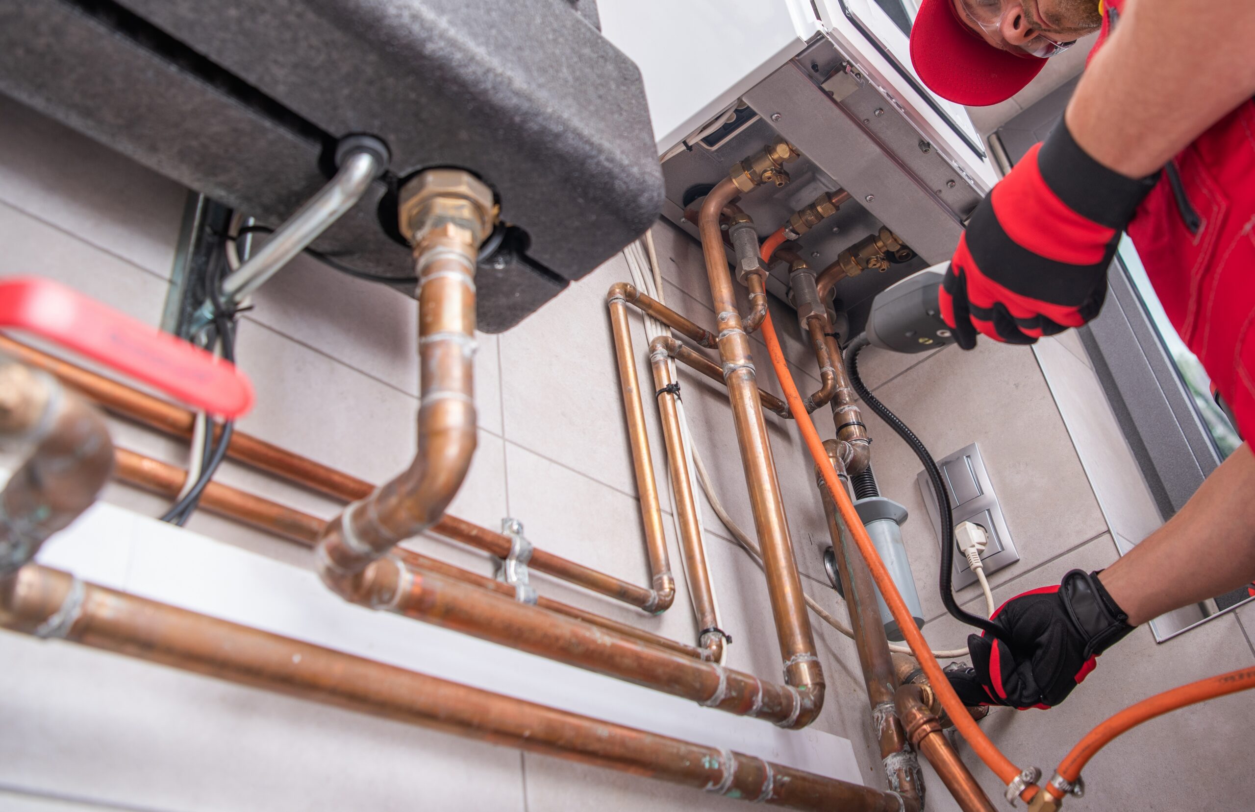 Heating,Specialist,With,Gas,Leak,Detector,In,His,Hand,Performing