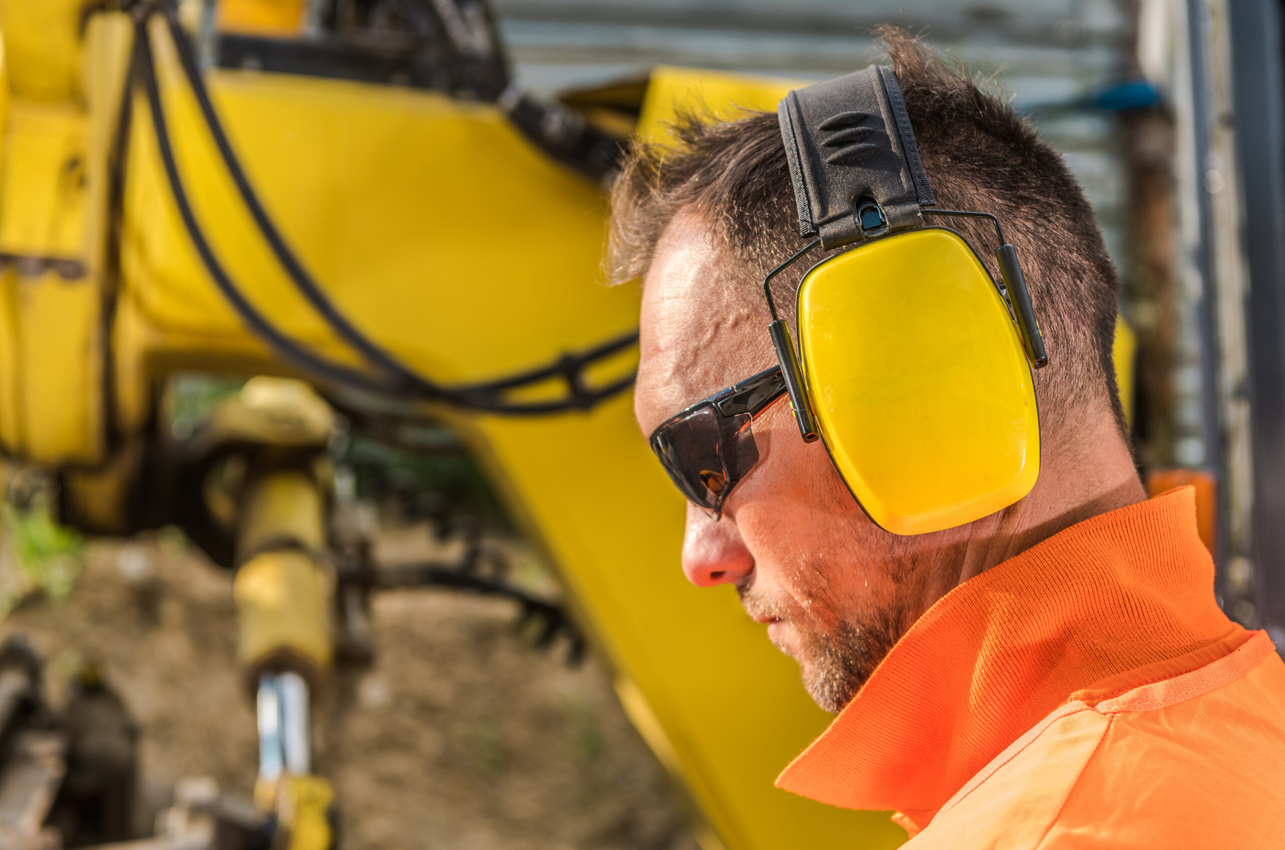 Noise,Reduction,Hearing,Protection,Headset.,Caucasian,Construction,Contractor,Wearing,Sunglasses