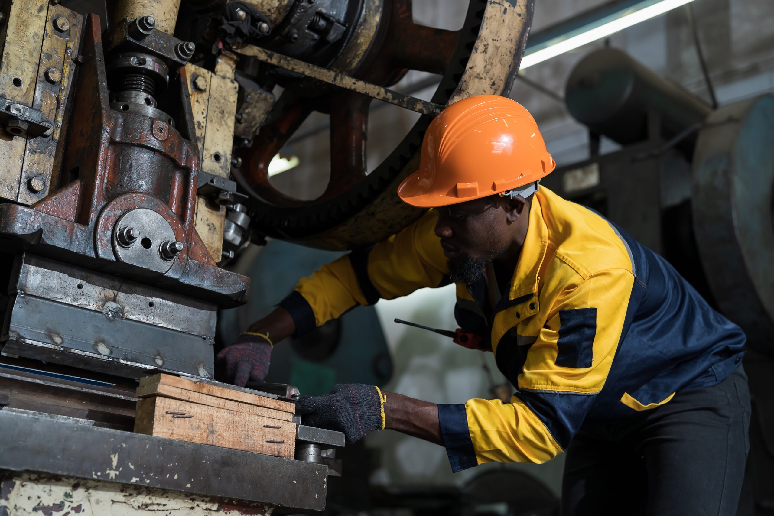 African,American,Male,Engineer,Repairing,And,Maintenance,Heavy,Lathe,Machine